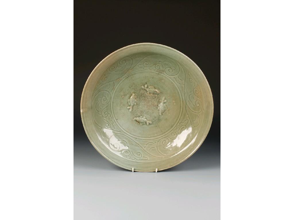 Appraisal: A CHINESE CELADON CHARGER with a central circular panel moulded