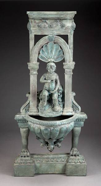 Appraisal: A Renaissance style patinated bronze wall fountain The central putto