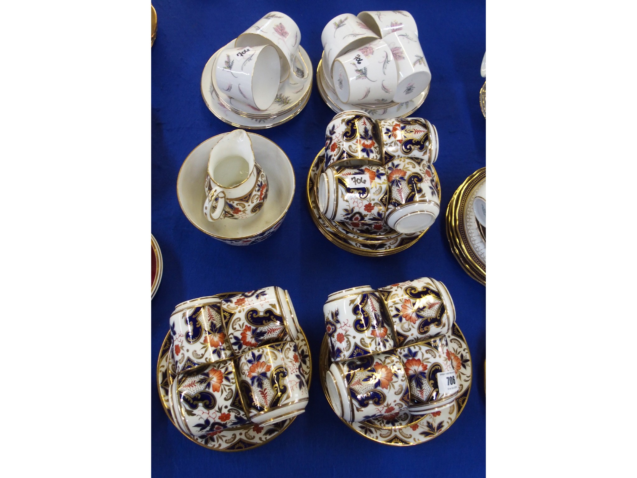 Appraisal: Porcelain Imari-decorated tea set for twelve with sugar bowl and