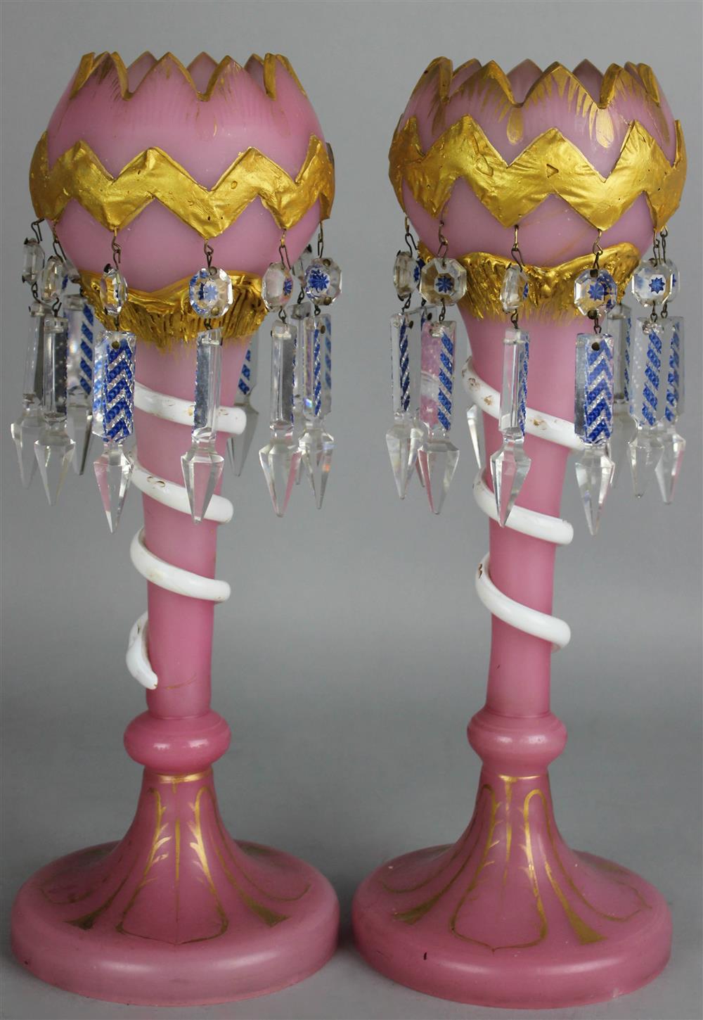 Appraisal: PAIR OF PINK OPAQUE GLASS LUSTRES enriched with white overlay