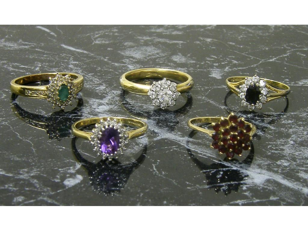 Appraisal: Five ct dress cluster rings gm