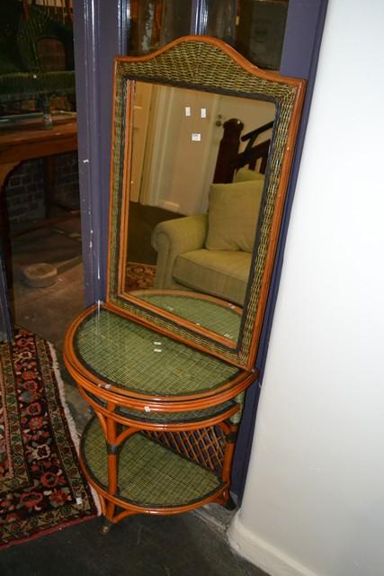 Appraisal: A CANE CONSOLE TABLE WITH MATCHING MIRROR A CANE CONSOLE