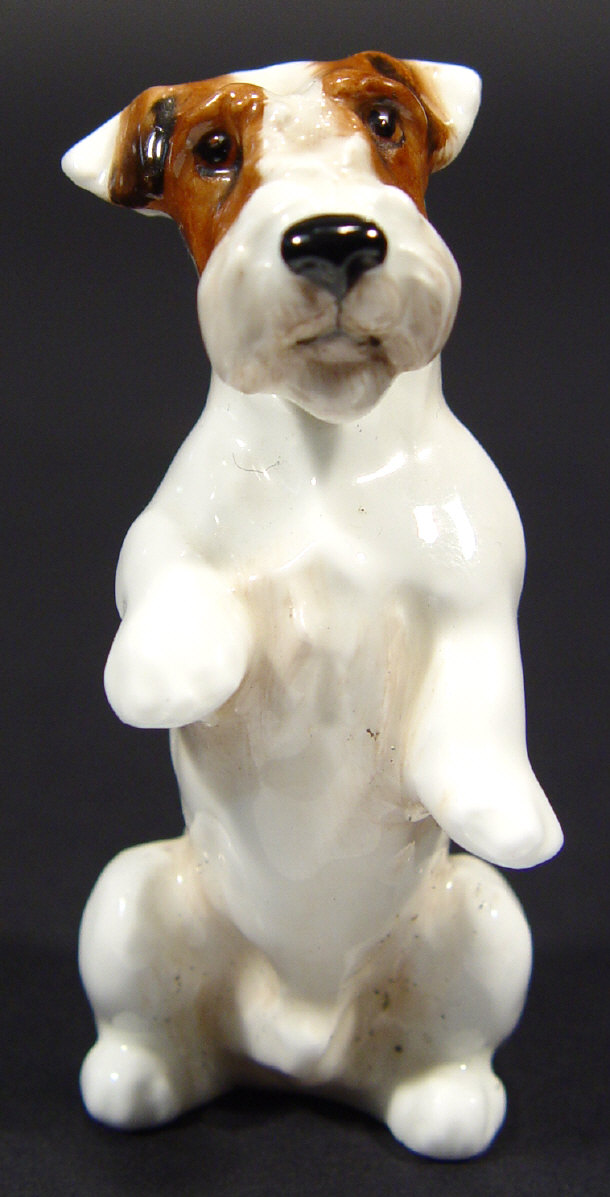 Appraisal: Small Royal Doulton begging terrier dog with hand painted decoration