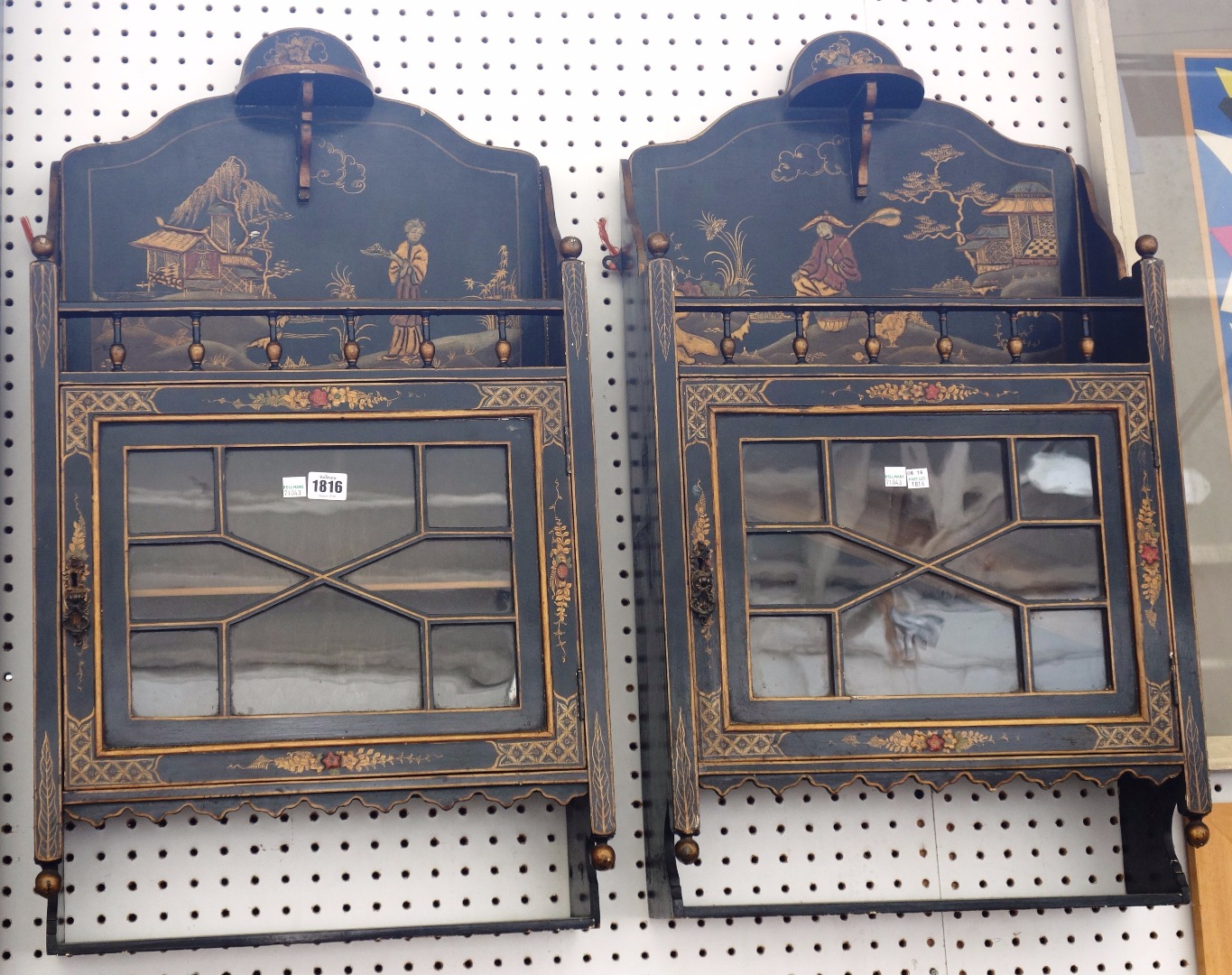 Appraisal: A pair of early th century black lacquer chinoiserie decorated