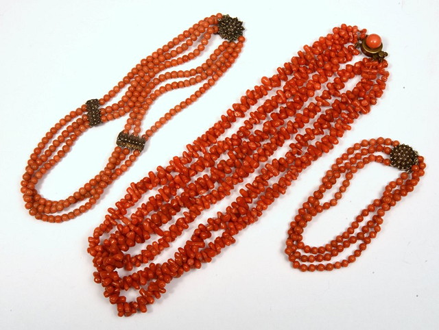 Appraisal: THREE CORAL BEAD NECKLACES including one of triple form with