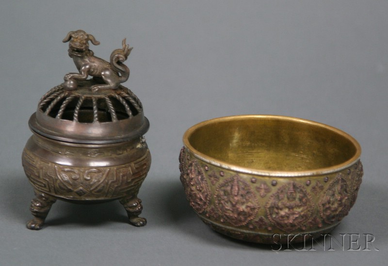 Appraisal: Two Metal Works th century an Indian brass bowl inlaid