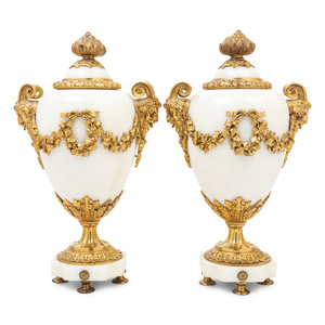 Appraisal: A Pair of French Gilt Bronze and Marble Urns th