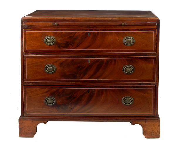 Appraisal: A George III inlaid mahogany chest of three drawers height