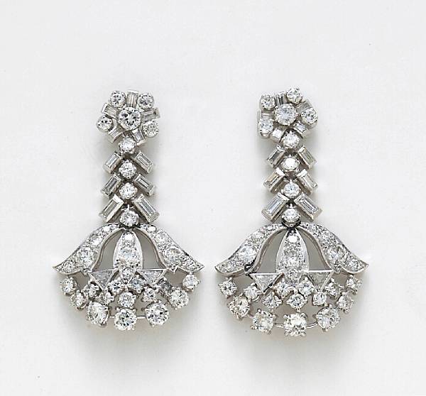 Appraisal: A pair of diamond pendant earrings estimated total diamond weight