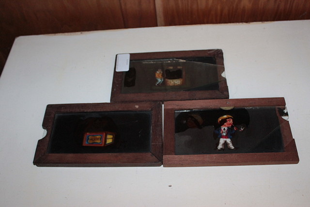 Appraisal: THREE TH CENTURY WOOD FRAMED MECHANICAL SLIDES consisting of a