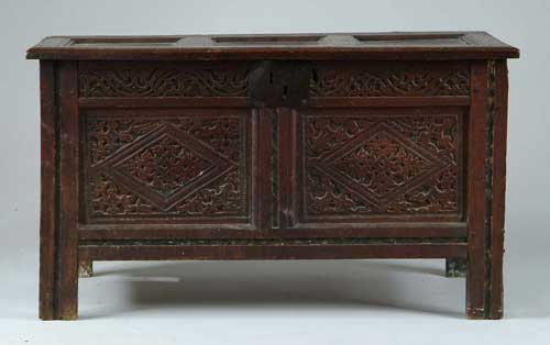 Appraisal: ENGLISH OAK CARVED COFFER The outside hinged lid has three