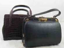 Appraisal: A crocodile handbag circa together with a Gladstone type handbag