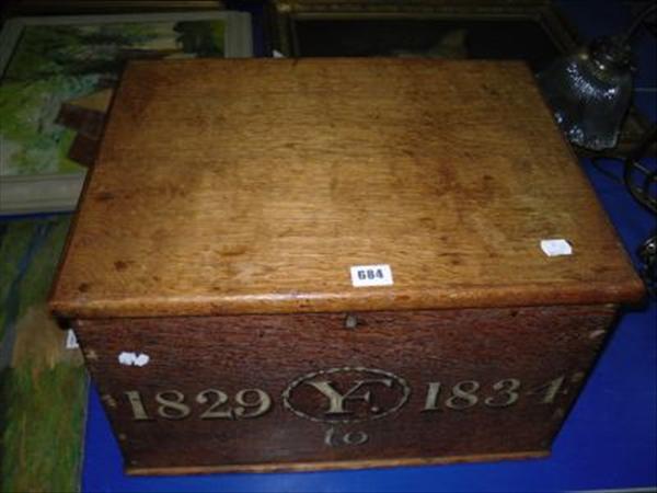 Appraisal: An oak box painted with the monogramme 'YH' for Francis