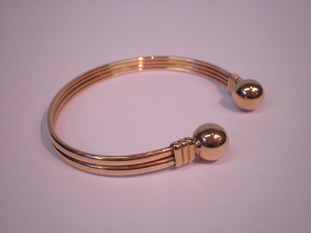 Appraisal: A ct gold slave bangle g