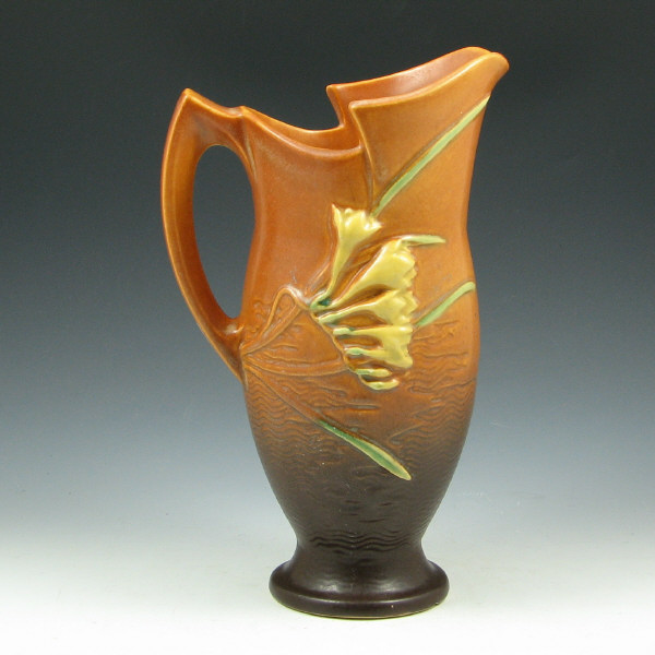 Appraisal: Roseville Freesia - Pitcher Roseville Freesia pitcher in brown Marked