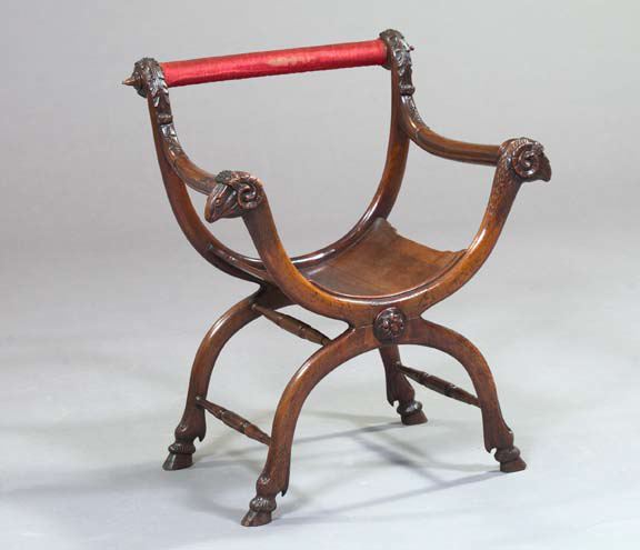 Appraisal: Italian Walnut Savanonola Chair late th century the padded crest