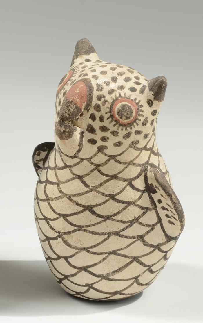 Appraisal: ZUNI PUEBLO TRADITIONAL CLAY OWL FIGURE having a repeating rust