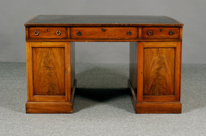 Appraisal: GEORGE III MAHOGANY PARTNER'S DESK WITH LEATHER TOP The rectangular