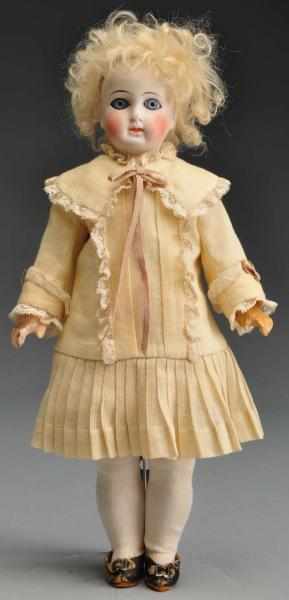 Appraisal: Early German Pale Bisque Doll Description Bisque head with flange