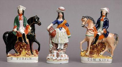 Appraisal: PAIR OF STAFFORDSHIRE EQUESTRIANS AND A FIGURE OF A SHEPHERDESS