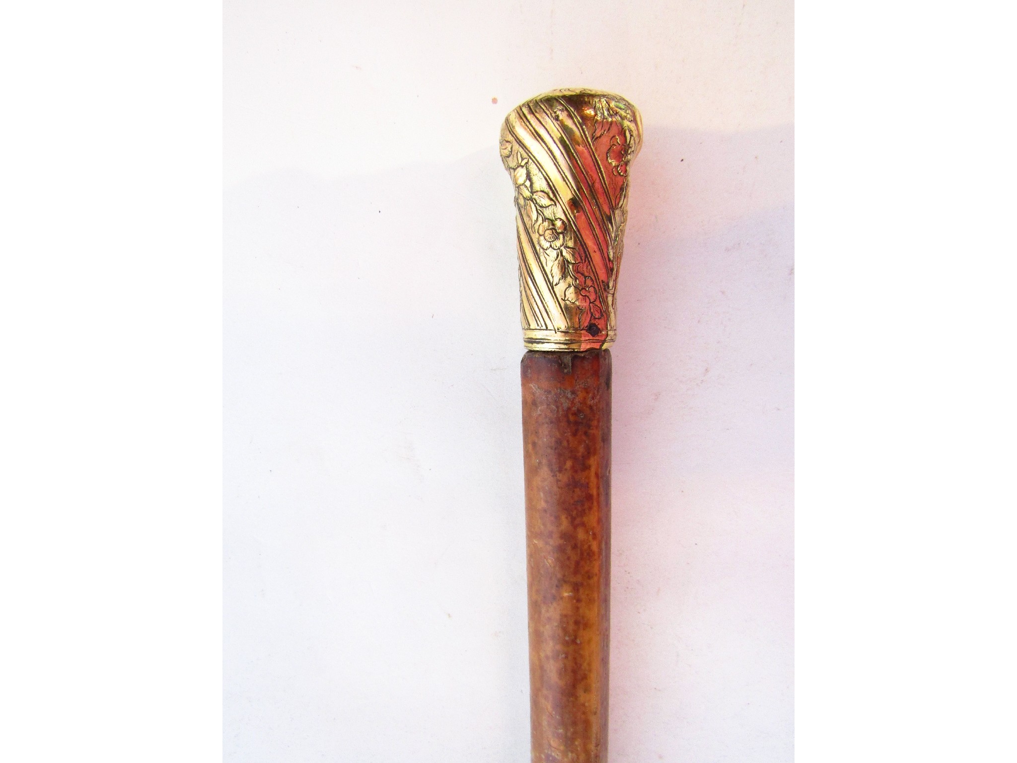 Appraisal: A Malacca walking cane with gold coloured metallic knop handle