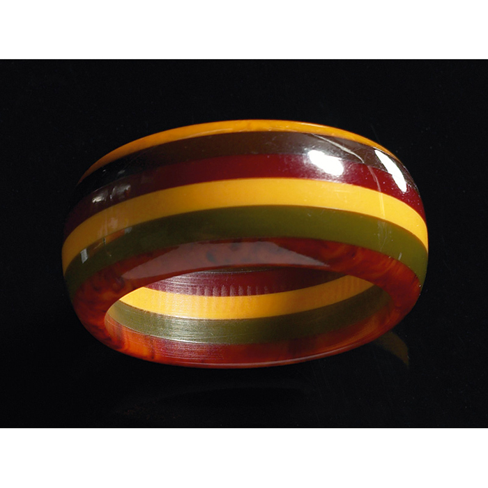 Appraisal: Bakelite laminated bracelet bangle in butterscotch olive amber marbleized orange