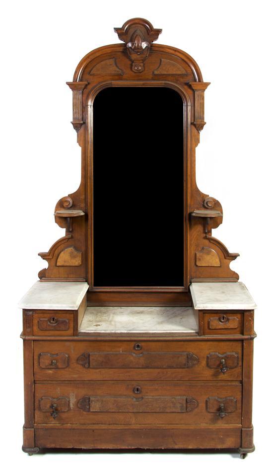 Appraisal: A Victorian Walnut Dresser with Mirror the superstructure set with