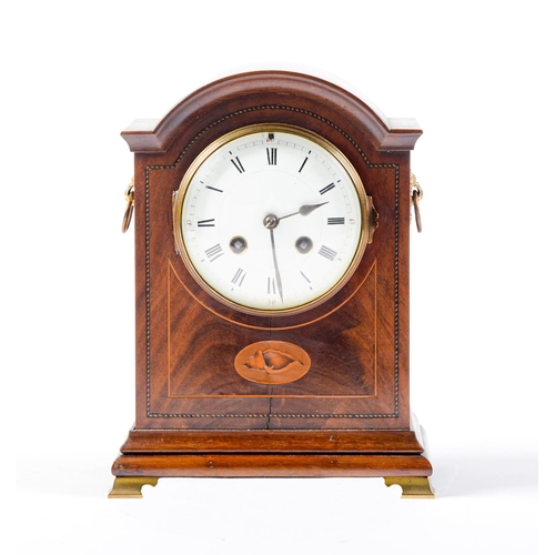 Appraisal: A breakarched mahogany and inlaid mantel clock c with enamel