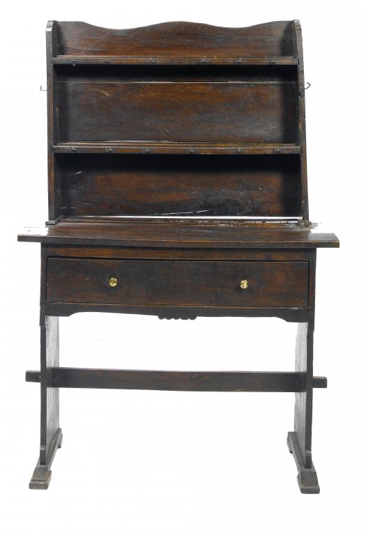 Appraisal: AN OAK TRESTLE-DRESSER WEST COUNTRY the undulating back with two