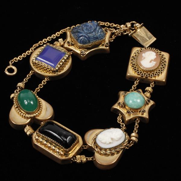 Appraisal: Vintage Victorian style brass slide charm bracelet with cameos and