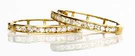 Appraisal: A pair of ct gold diamond hoop earrings estimated total