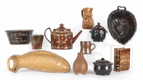 Appraisal: Miscellaneous redware and earthenware to include a Bennington type book