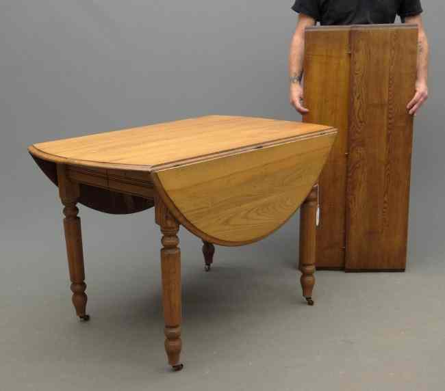 Appraisal: Victorian oak dropleaf table with carved legs Top '' x