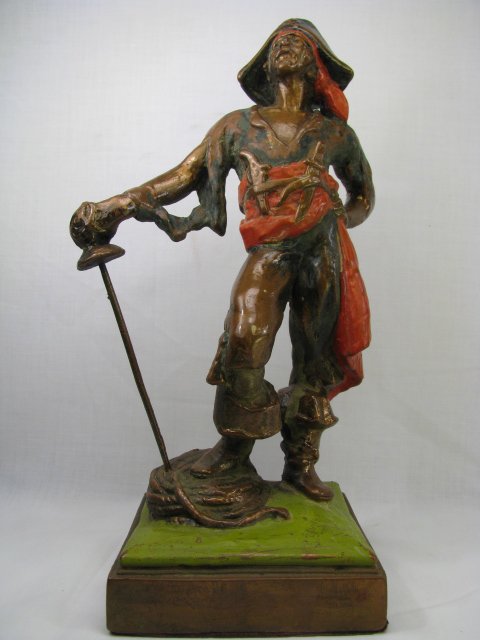 Appraisal: Bronze clad and polychrome painted pirate statue by Paul Herzel