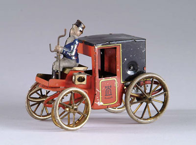 Appraisal: LEHMANN WIND-UP COACH Lithographed and hand-painted tinplate closed coach with