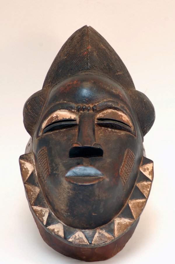 Appraisal: Heavy Baule carved wood face mask with black encrusted patina