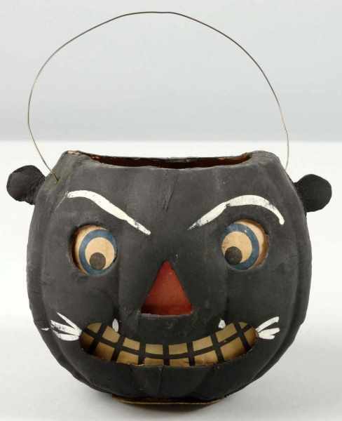 Appraisal: Cardboard Halloween Jack-O-Lantern with Ears Description German Original paper label