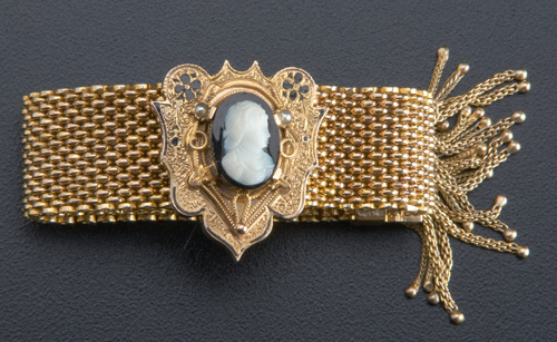 Appraisal: k garter bracelet with taille d' pargne enamel and a