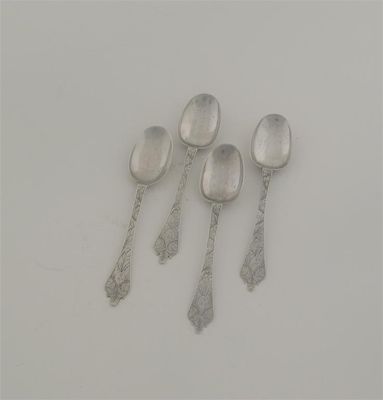 Appraisal: A matched set of four William III engraved trefid teaspoons