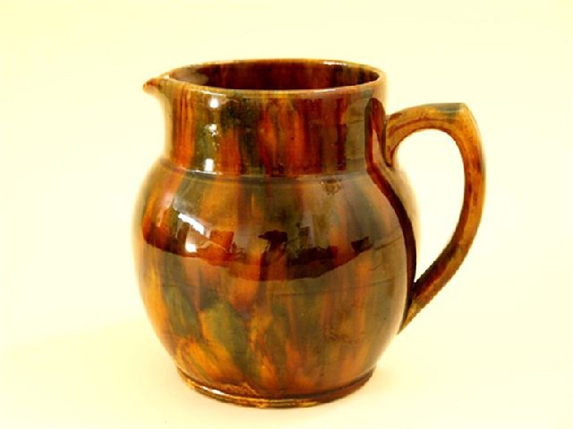 Appraisal: JOHN CAMPBELL MOTTLED GLAZED TABLE JUG DATED