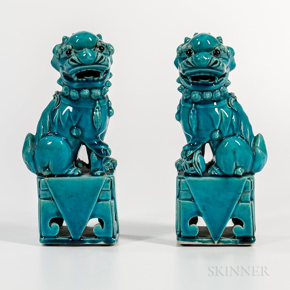 Appraisal: Pair of Turquoise-glazed Foo Dogs Pair of Turquoise-glazed Foo Dogs