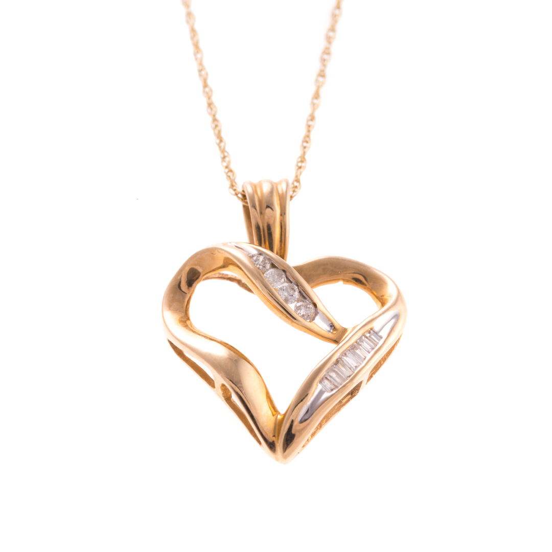 Appraisal: A Lady's Diamond Heart Pendant in K Gold K yellow