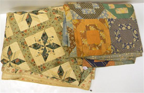 Appraisal: Two polychrome pieced cotton patchwork quilts stains fading and loss