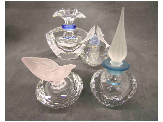 Appraisal: Swarovski Crystal Miniatures grouping four items all perfume bottles in