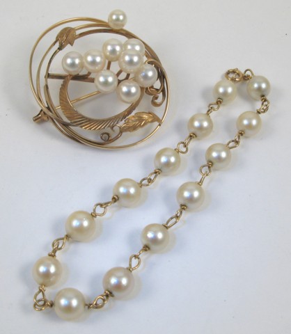 Appraisal: TWO ARTICLES OF PEARL JEWELRY including a k yellow gold