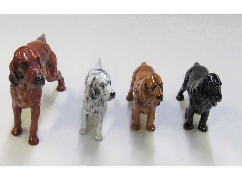 Appraisal: Four Royal Doulton figures of dogs to include two spaniels