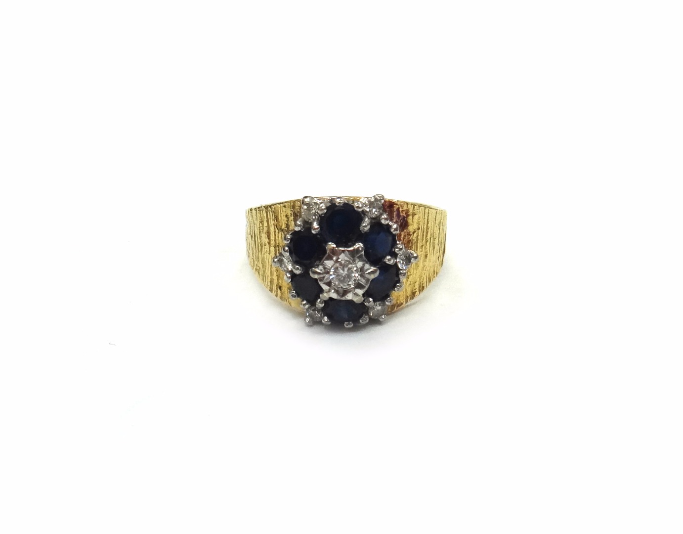 Appraisal: A 's sapphire and diamond cluster ring illusion set at