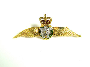 Appraisal: An 'RAF' ct gold 'wings' brooch With green enamelled laurel