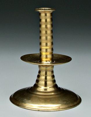 Appraisal: th century brass candlestick trumpet form with tapered and ringed