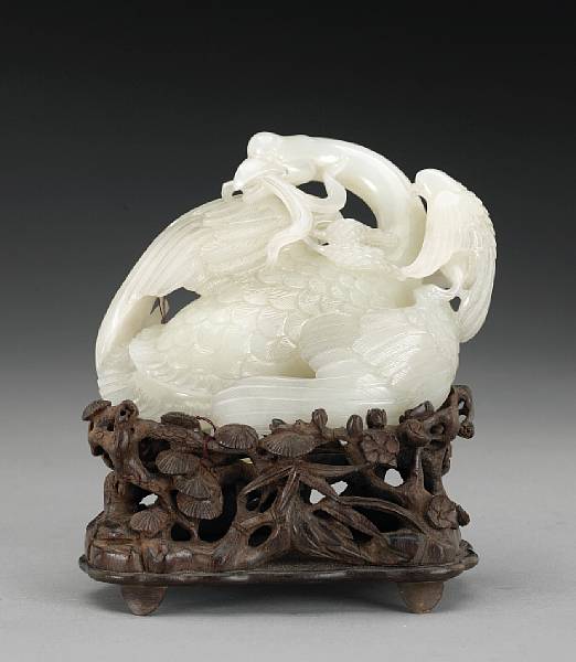 Appraisal: A white jade of two birds Qianlong Period Depicting a